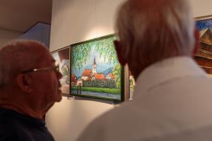 Likovna dela slikarjev, ki so ustvarjali na srečanju v Hiši čez cesto 1